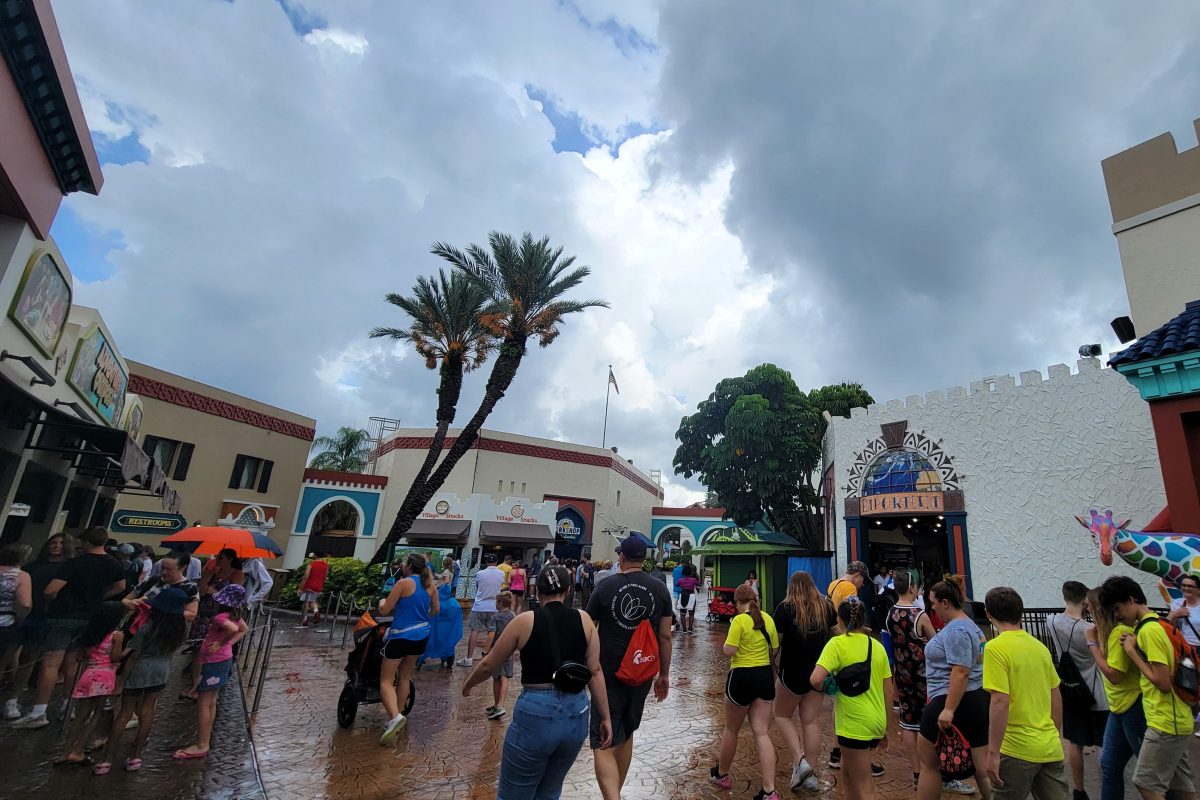 Entrance to Busch Gardens Tampa on a cloudy day with wet sidewalks