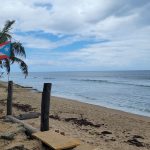 Puerto Rican flag flying on a beach